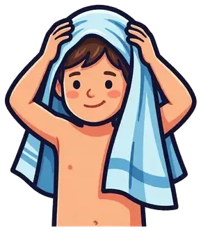 A child drying his hair with a towel
